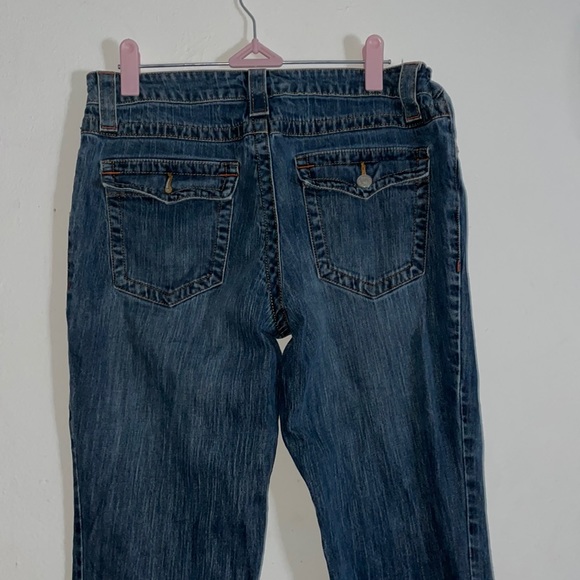 low rise boot jeans with red detailing on seams - Picture 3 of 5